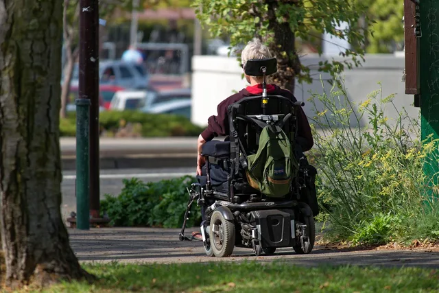 motorized wheelchair, wheelchair, elderly, man, motorized, backpack, sunny day, pavement, disabled, street, wheelchair, wheelchair, wheelchair, wheelchair, wheelchair, disabled. Accessible U.S. travel: why access is uneven, not absent