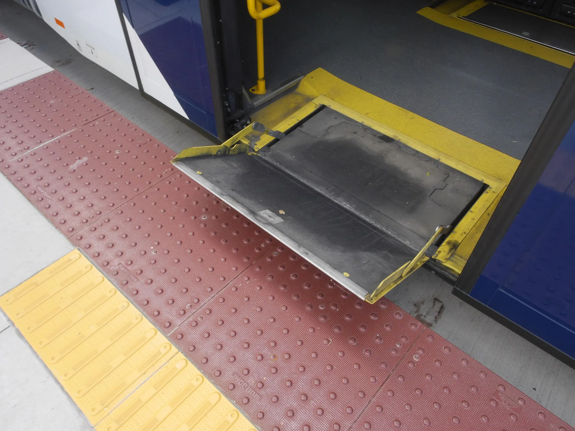 Wheelchair ramp for level boarding on a Metro Transit BRT bus in Madison, Wisconsin. Accessible trip: two-day Chicago itinerary with slack and handovers