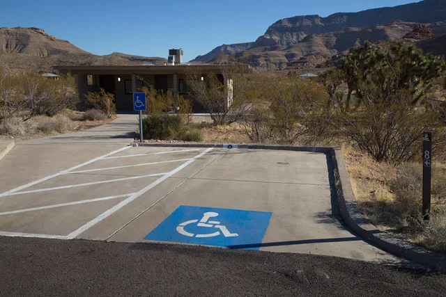 Campsite 8 is wheelchair accessible. It has a cement parking spot with room for side-entry van. This is also the closest parking for the south restroom. It is adjacent to campsites 5, 6, and 7, which are not accessible. Photo by the Bureau of Land Management Arizona. Choosing Accessible Tour Operators by Service Model